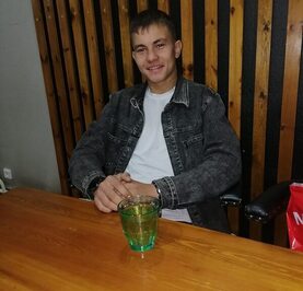 Николай